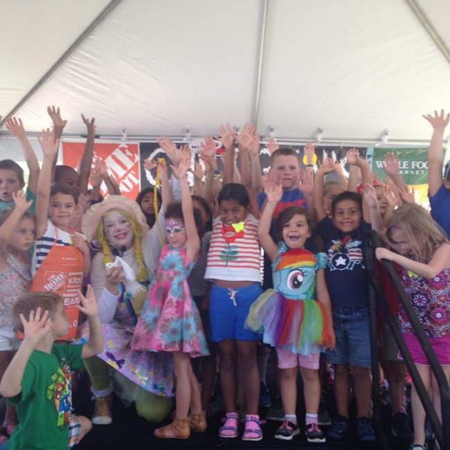 Corky Magic with children at home depot event
